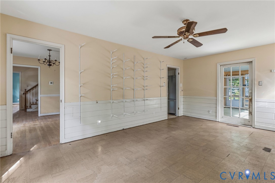11840 Winfore Drive Midlothian, VA 23113 - Photo 14 of 59 a view of empty room with wooden floor and fan