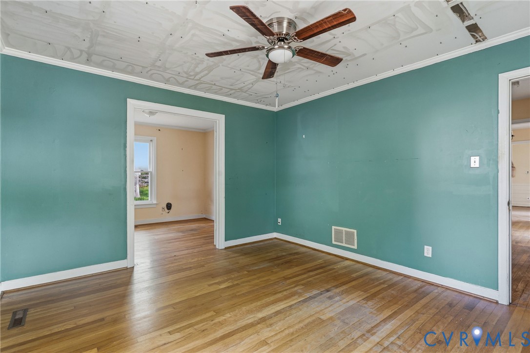 11840 Winfore Drive Midlothian, VA 23113 - Photo 16 of 59 a view of empty room with wooden floor