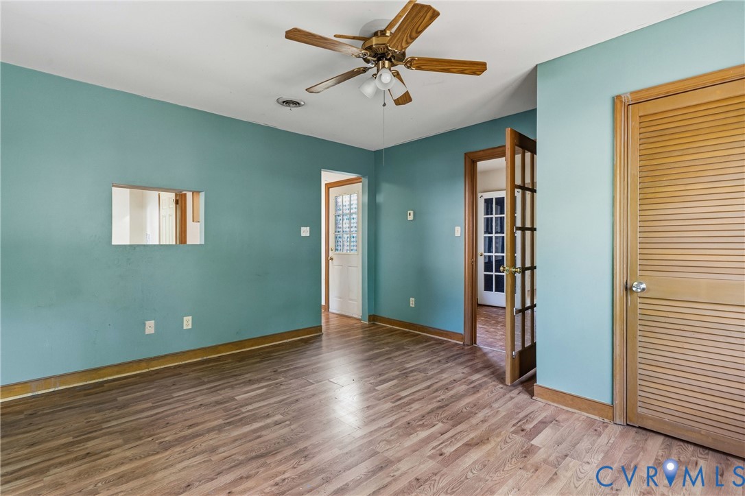 11840 Winfore Drive Midlothian, VA 23113 - Photo 25 of 59 a view of room with window closet and wooden floor
