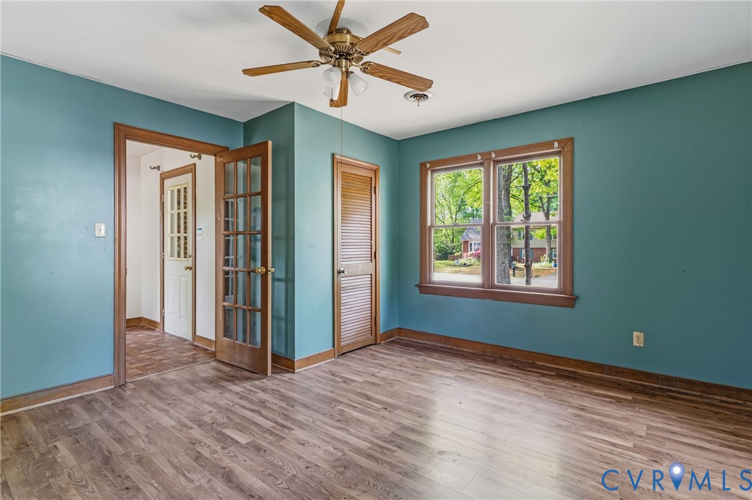 11840 Winfore Drive Midlothian, VA 23113 - Photo 27 of 59 a view of empty room with wooden floor and fan