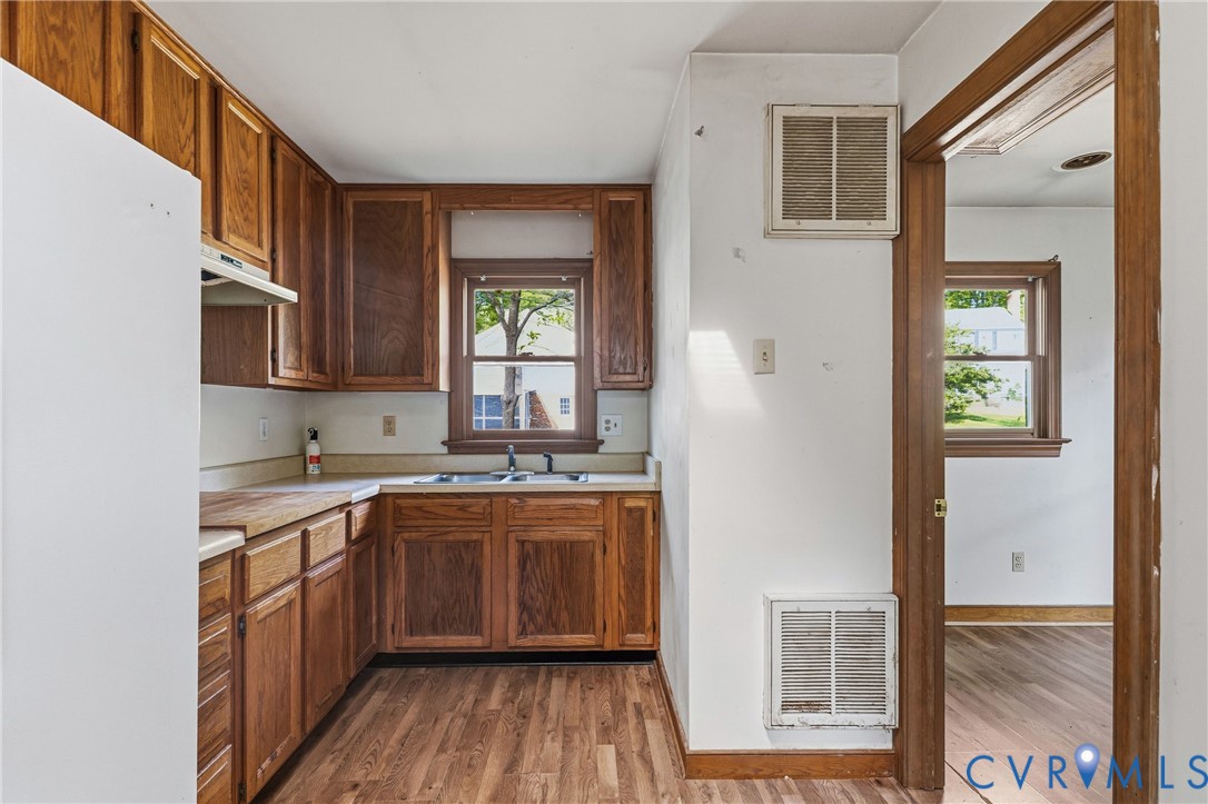 11840 Winfore Drive Midlothian, VA 23113 - Photo 29 of 59 a kitchen with stainless steel appliances granite countertop a sink stove and refrigerator