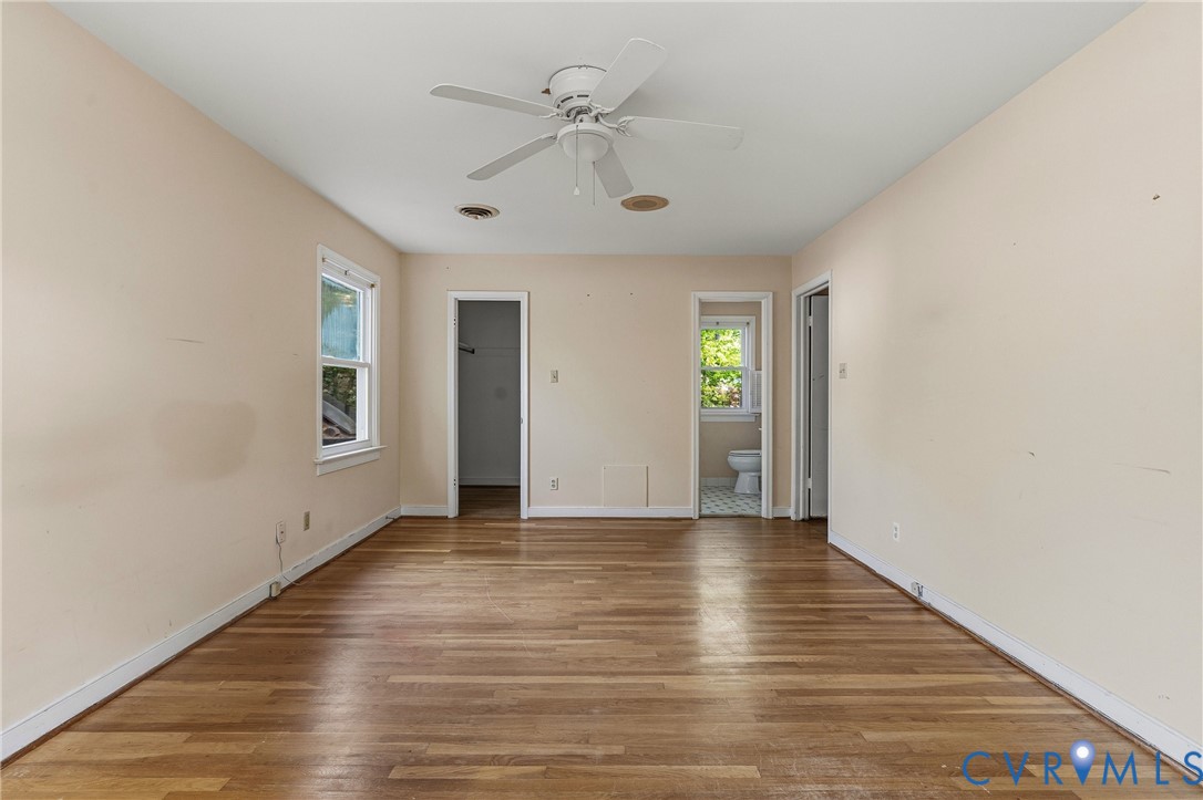11840 Winfore Drive Midlothian, VA 23113 - Photo 39 of 59 wooden floor in an empty room with a window