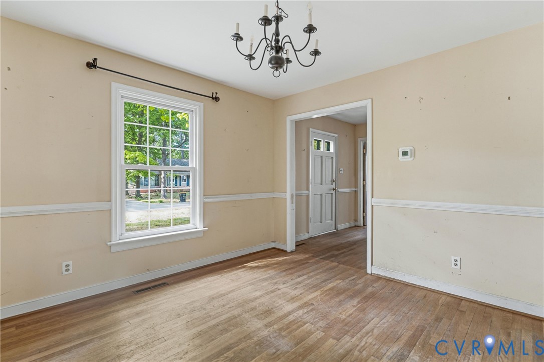 11840 Winfore Drive Midlothian, VA 23113 - Photo 4 of 59 wooden floor in an empty room with a window