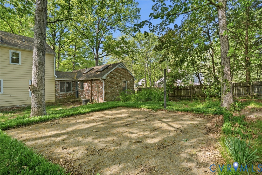 11840 Winfore Drive Midlothian, VA 23113 - Photo 54 of 59 a view of a house with a tree in the background