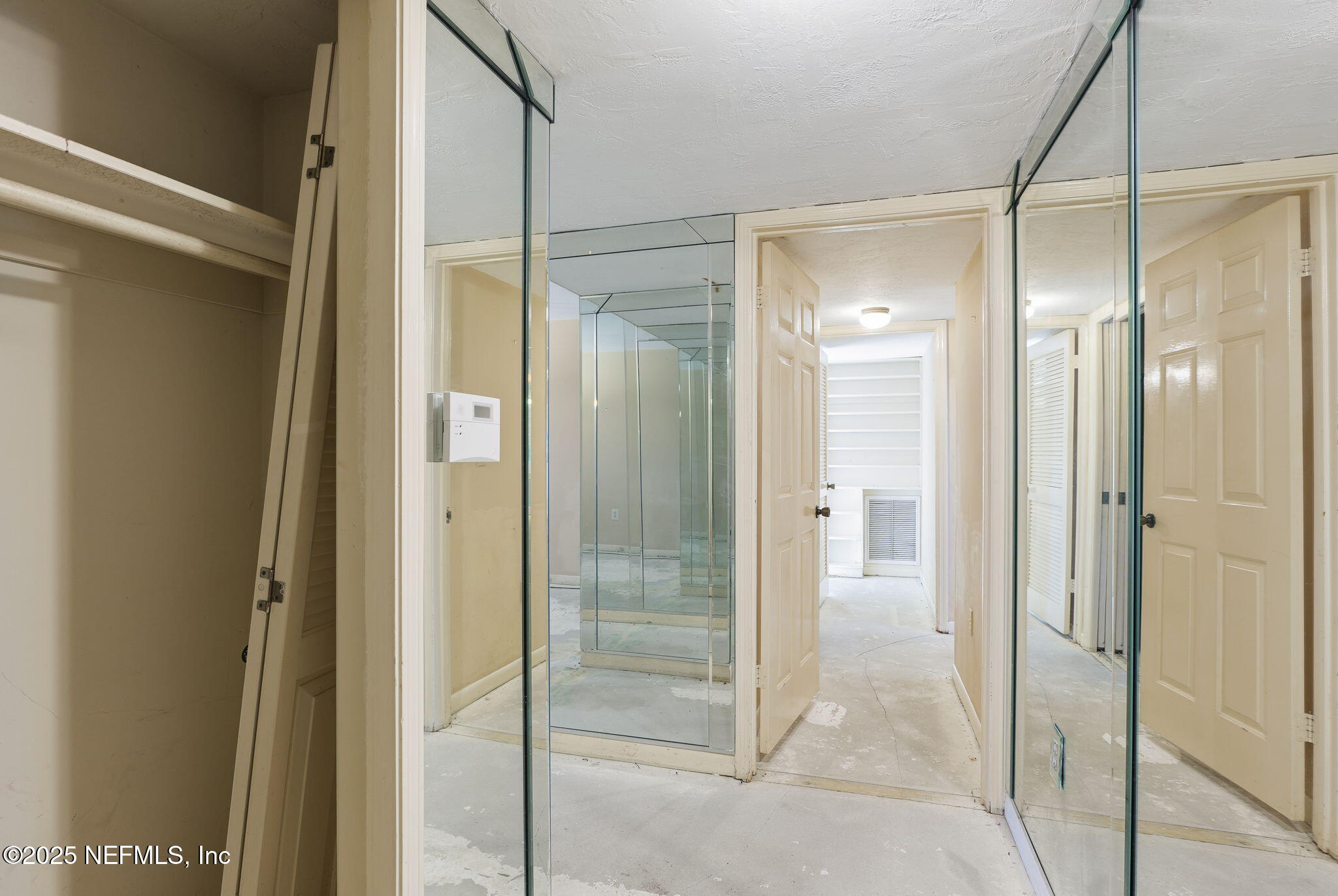 10 10th Street, Unit 2 Atlantic Beach, FL 32233 - Photo 11 of 43 a bathroom with a glass shower door