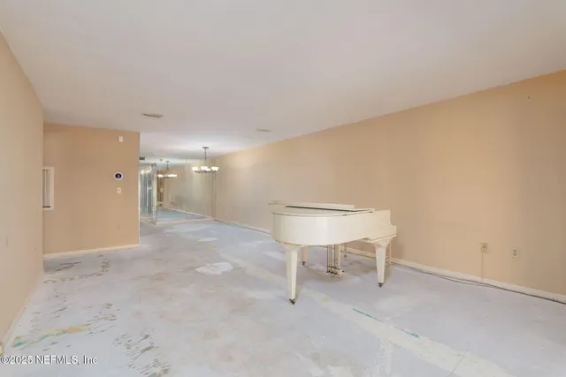 a view of staircase with large window