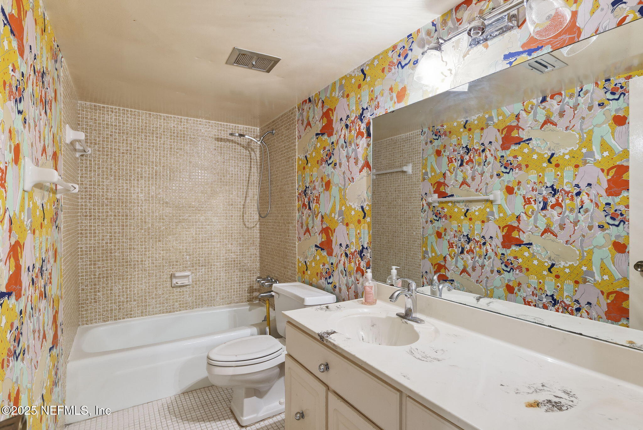 10 10th Street, Unit 2 Atlantic Beach, FL 32233 - Photo 29 of 43 a bathroom with a sink and a mirror