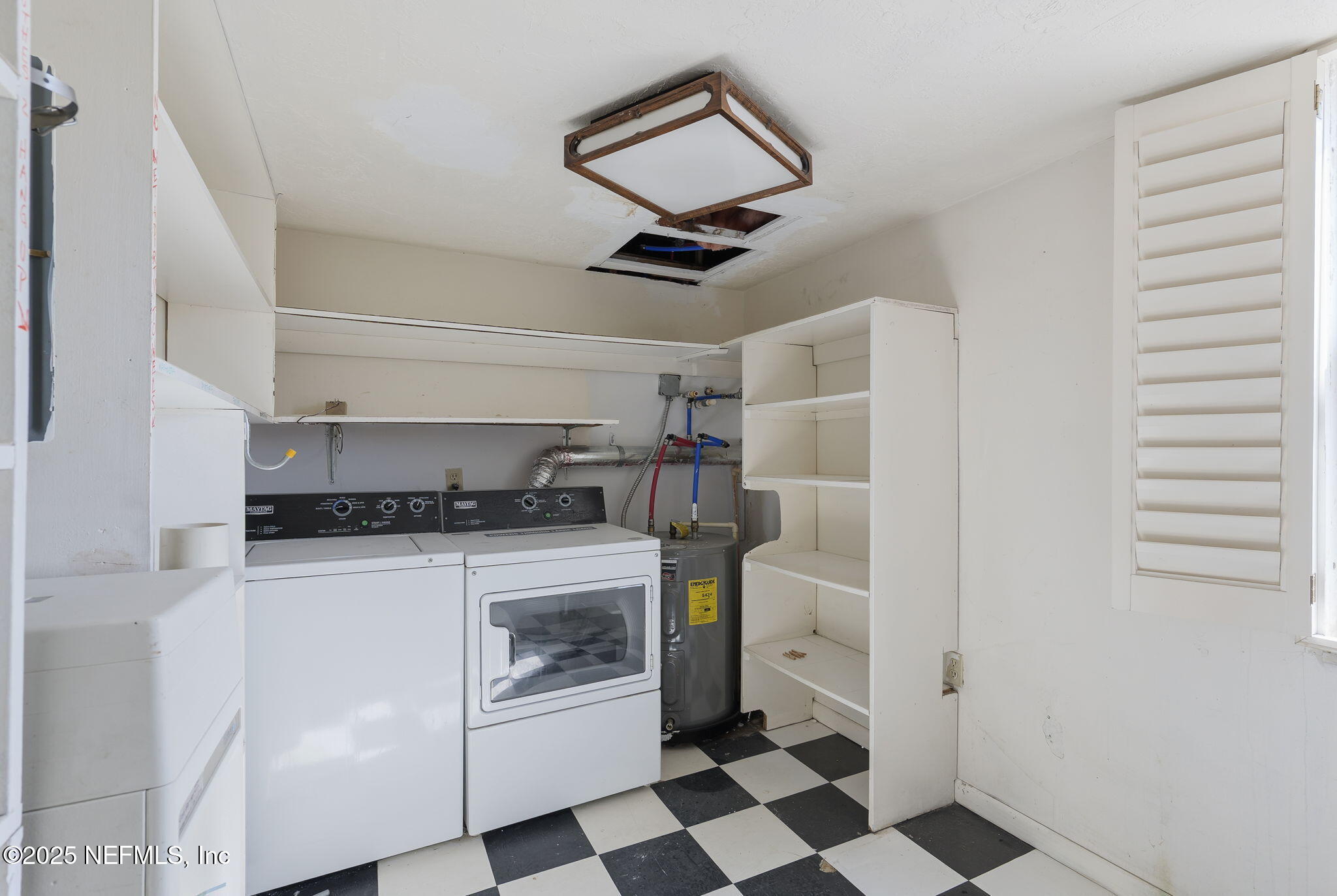 10 10th Street, Unit 2 Atlantic Beach, FL 32233 - Photo 37 of 43 a kitchen with stainless steel appliances granite countertop a refrigerator and a stove top oven