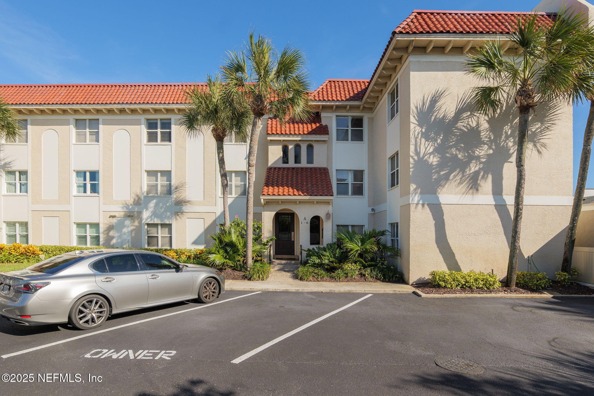 10 10th Street, Unit 2 Atlantic Beach, FL 32233 - Photo 8 of 43 a front view of a house with parking space