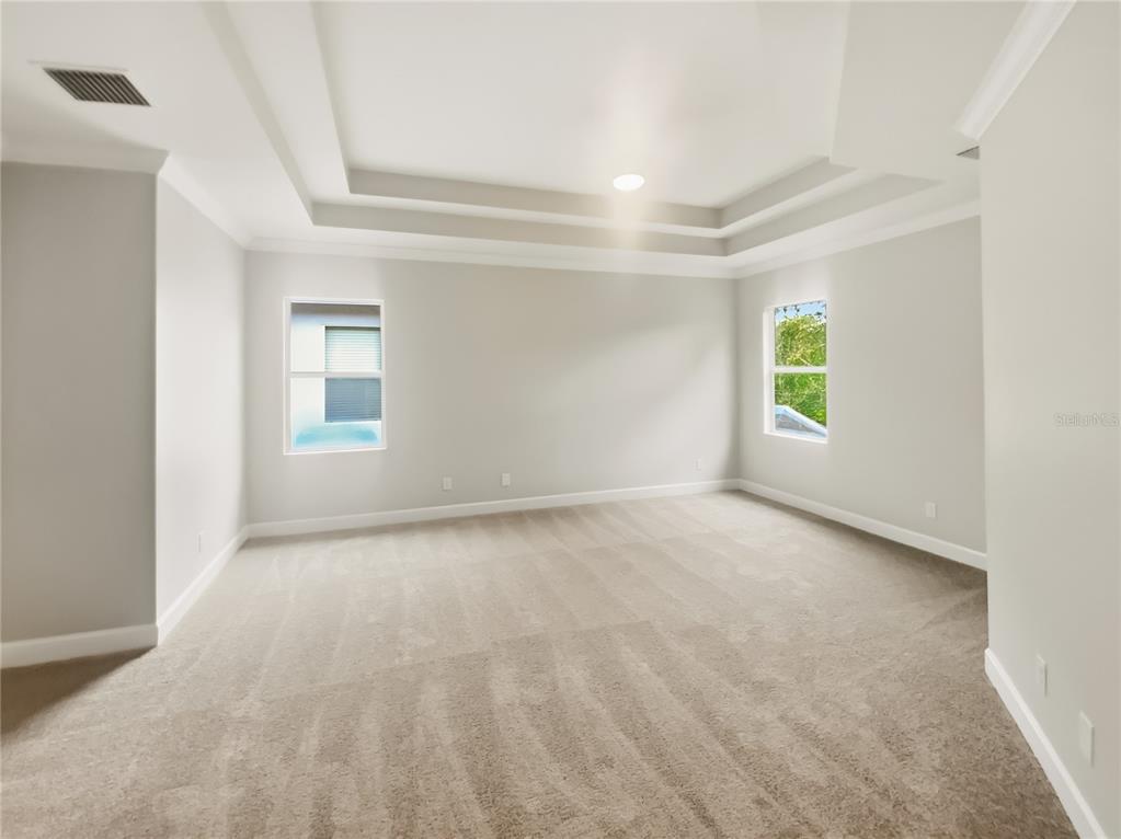 4307 Rustic Pine Place Wesley Chapel, FL 33544 - Photo 26 of 38 an empty room with windows and closet