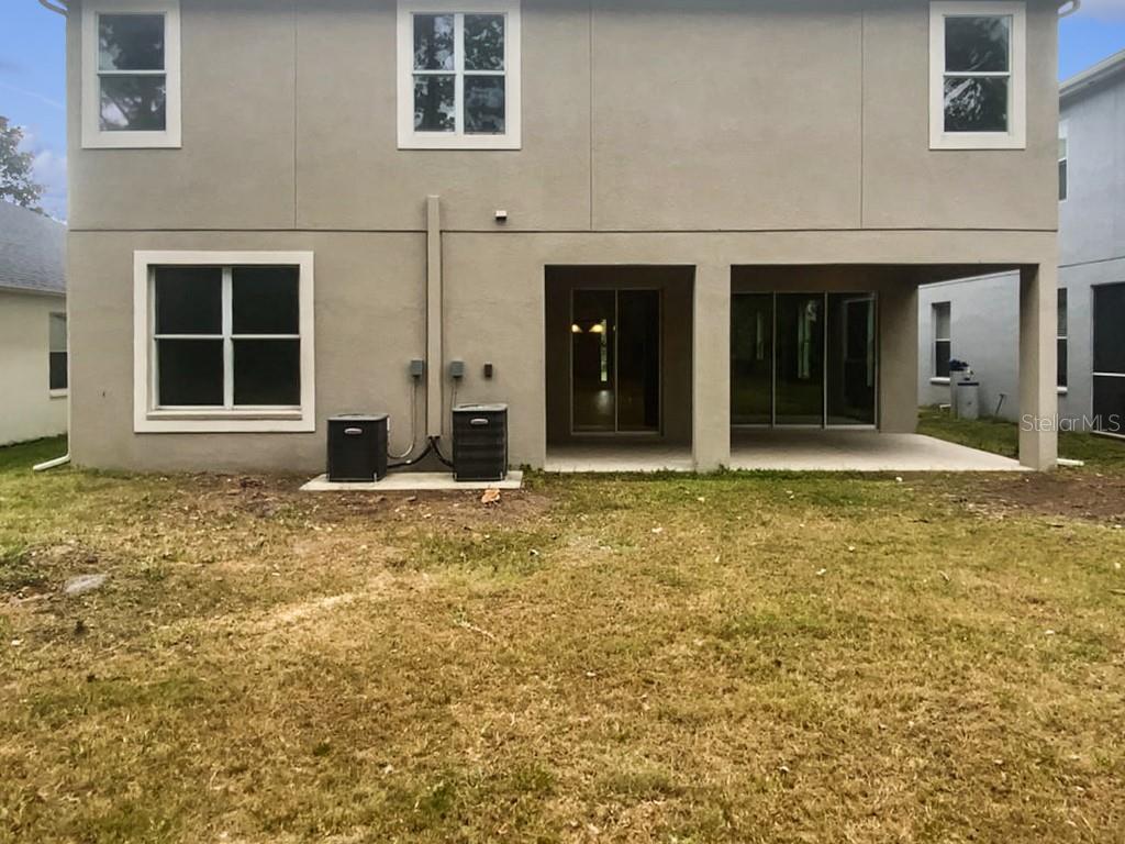 4307 Rustic Pine Place Wesley Chapel, FL 33544 - Photo 6 of 38 a view of house with front door