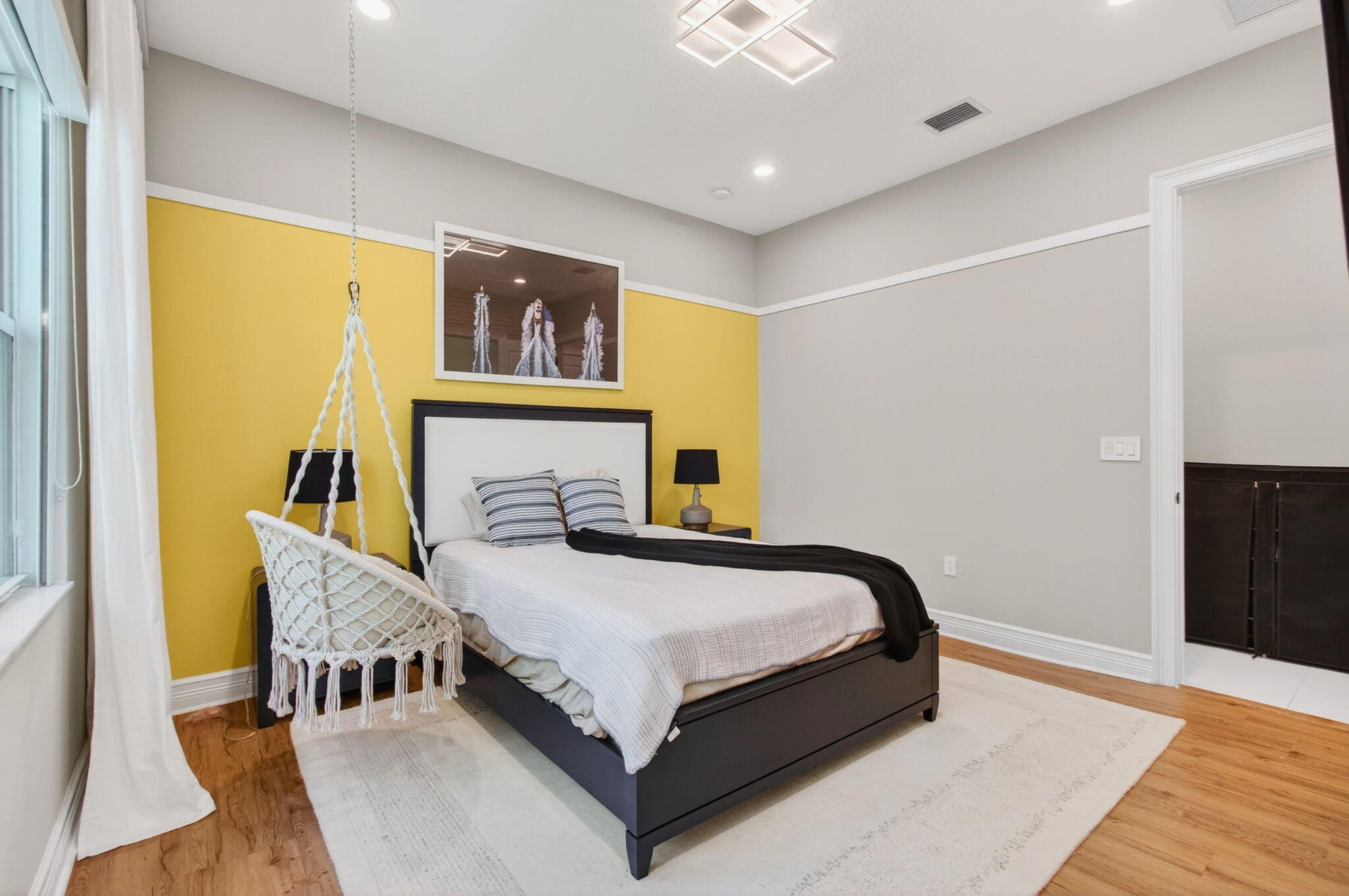 19886 Meadowside Lane Boca Raton, FL 33498 - Photo 32 of 84 a bed sitting in a bedroom next to a window