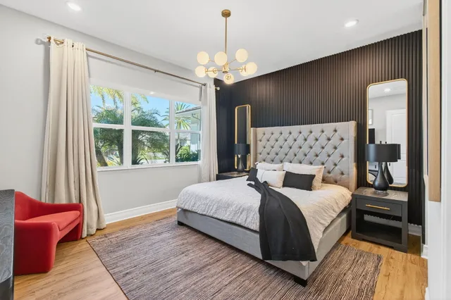 an aerial view of multiple houses with yard