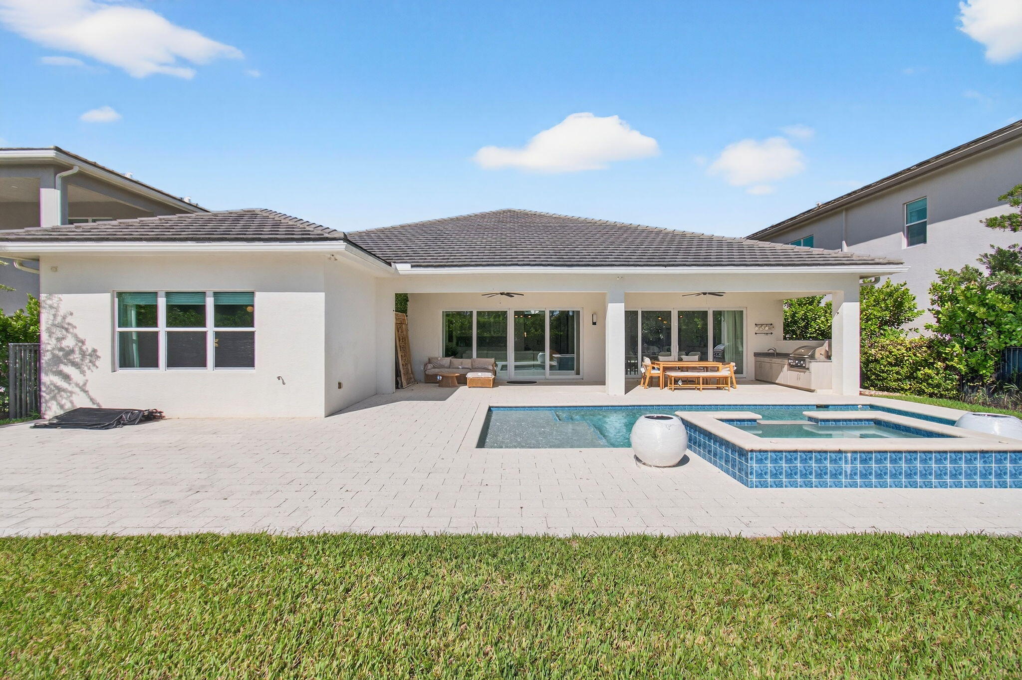 19886 Meadowside Lane Boca Raton, FL 33498 - Photo 56 of 84 a front view of a house with a yard