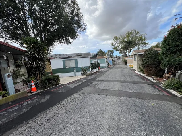 a view of a street with cars