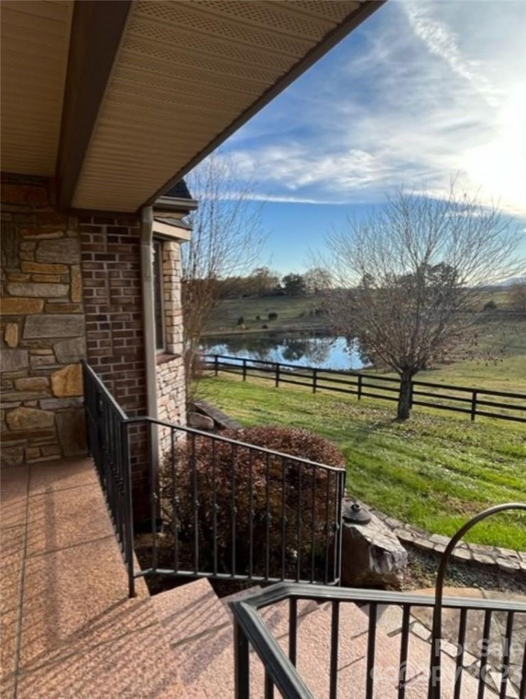 7100 Highway 108 Mill Spring, NC 28756 - Photo 32 of 48 a view of a swimming pool with a patio