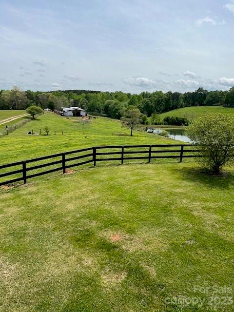 7100 Highway 108 Mill Spring, NC 28756 - Photo 37 of 48 a view of a yard with a lake view