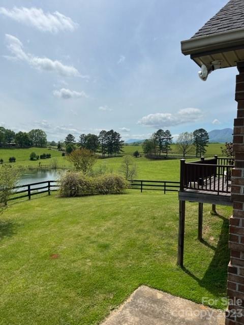 7100 Highway 108 Mill Spring, NC 28756 - Photo 40 of 48 a view of a golf course with chairs