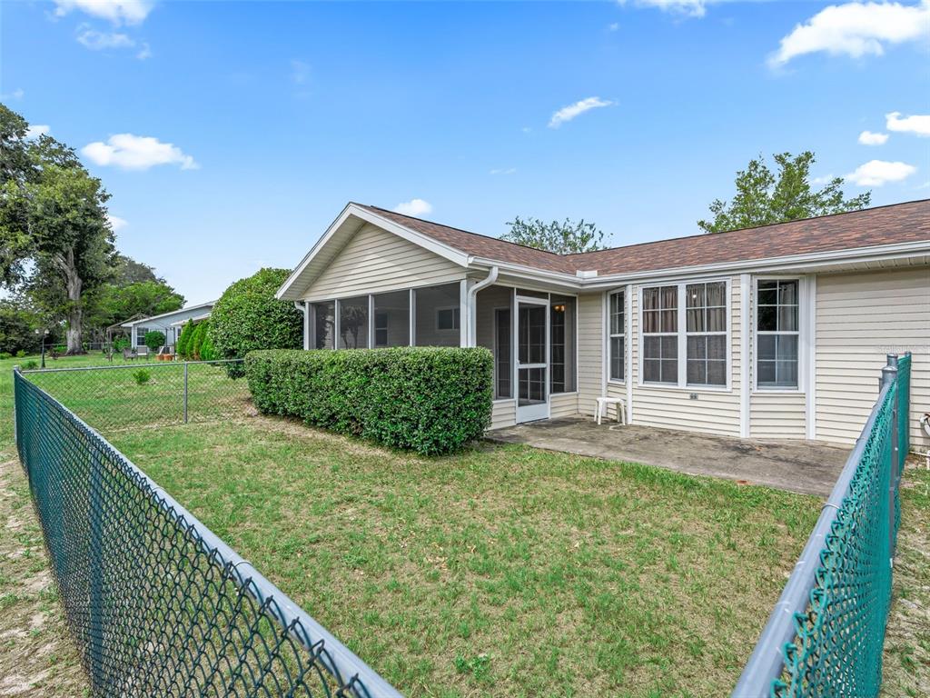 8850 Southwest 116th Place Road Ocala, FL 34481 - Photo 29 of 53 a view of a house with backyard and porch