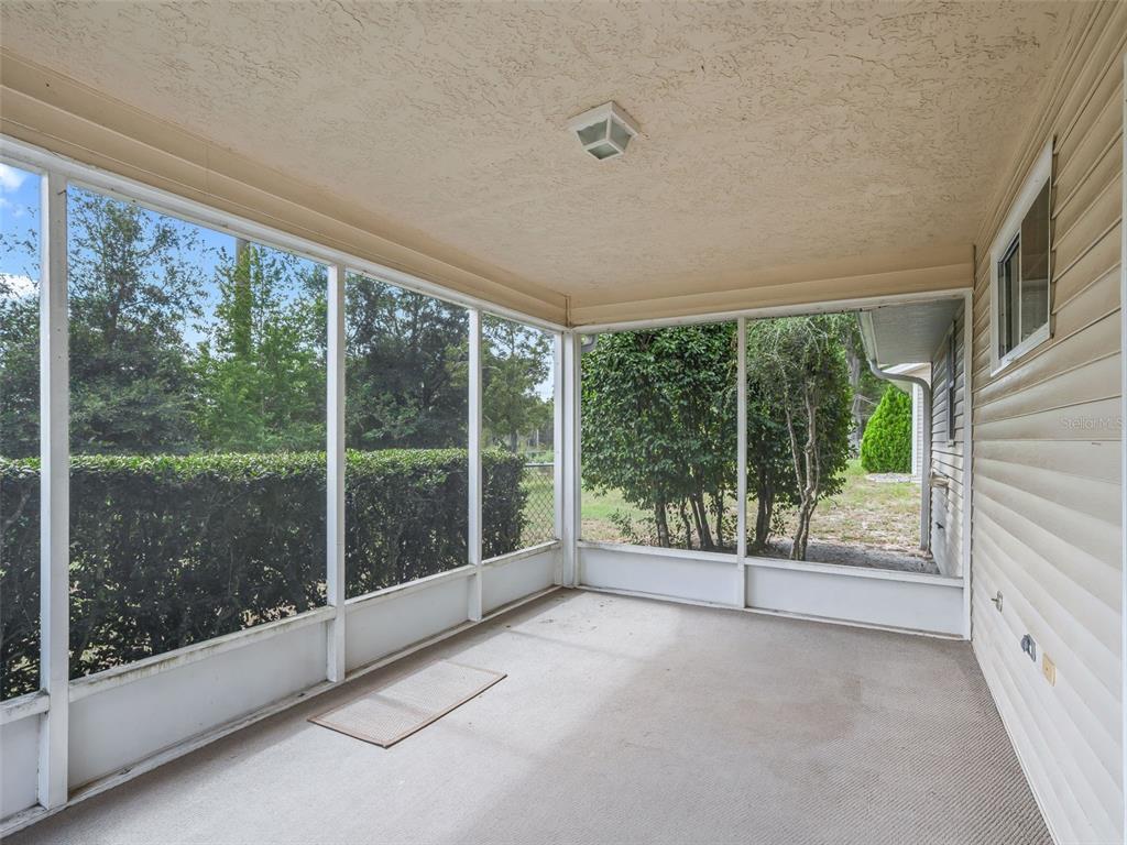8850 Southwest 116th Place Road Ocala, FL 34481 - Photo 34 of 53 a view of a room with window and pool