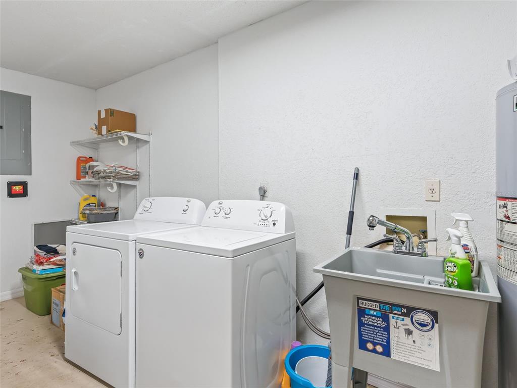 8850 Southwest 116th Place Road Ocala, FL 34481 - Photo 36 of 53 a utility room with dryer and washer