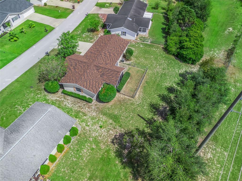 8850 Southwest 116th Place Road Ocala, FL 34481 - Photo 38 of 53 an aerial view of a house with garden space and street view