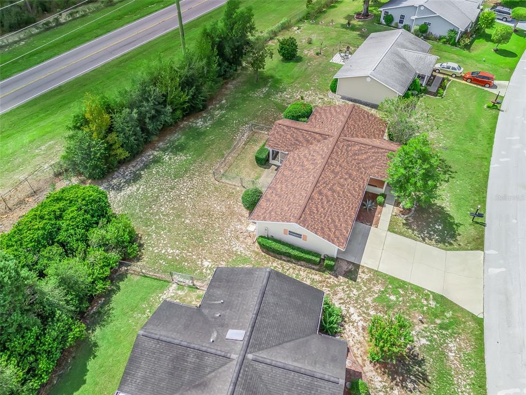 8850 Southwest 116th Place Road Ocala, FL 34481 - Photo 40 of 53 an aerial view of house with yard