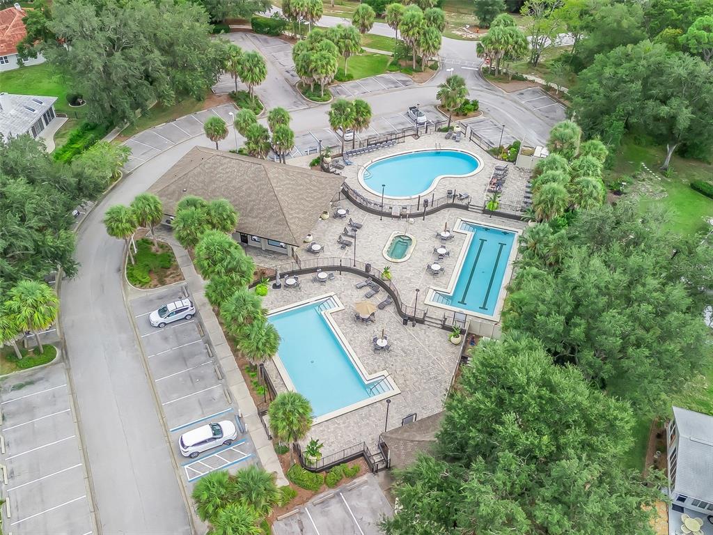 8850 Southwest 116th Place Road Ocala, FL 34481 - Photo 48 of 53 an aerial view of a swimming pool and outdoor space