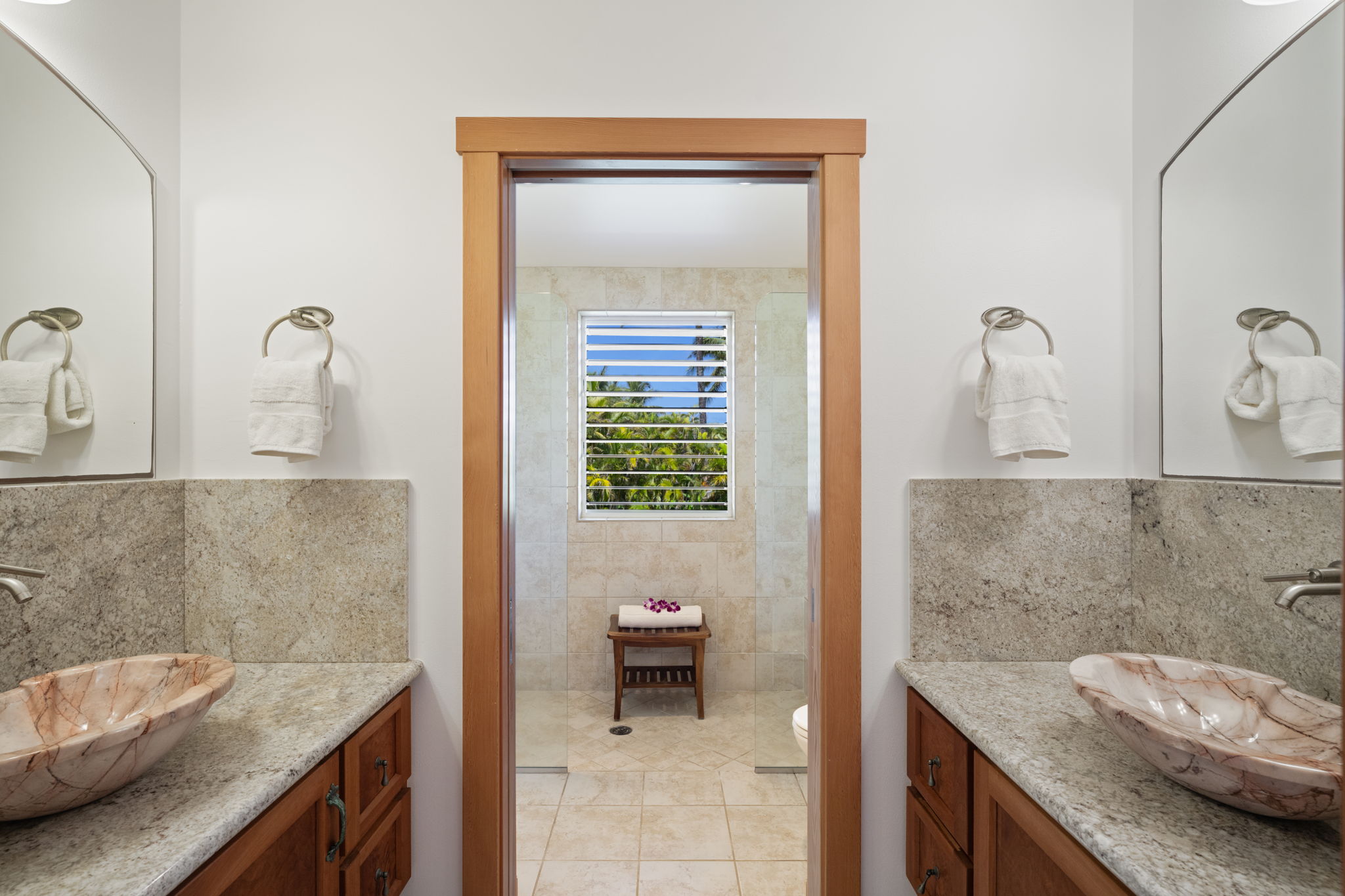 7312 Alealea Road Hanalei, HI 96714 - Photo 17 of 30 a bathroom with a granite countertop sink and a vanity