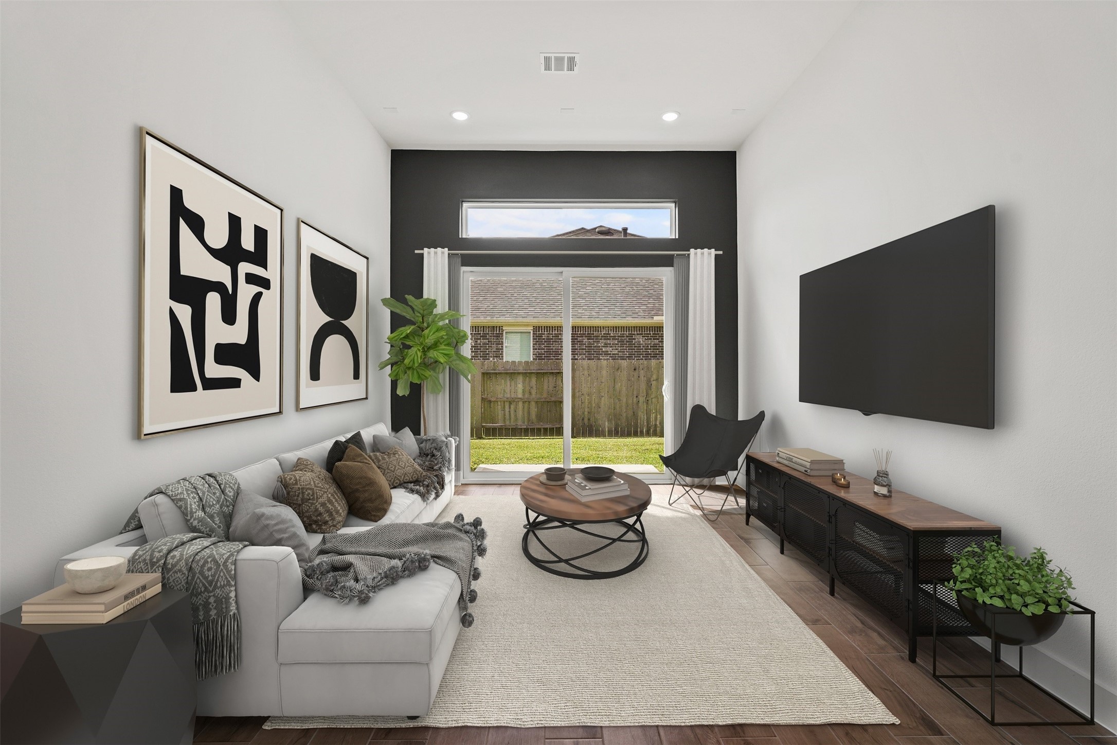 3607 Wellborn Drive Fulshear, TX 77441 - Photo 11 of 27 a living room with furniture and a flat screen tv