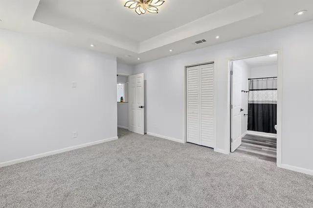 an empty room with a hallway