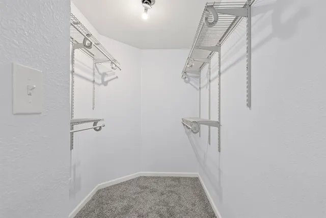 a view of a room with racks on the wall