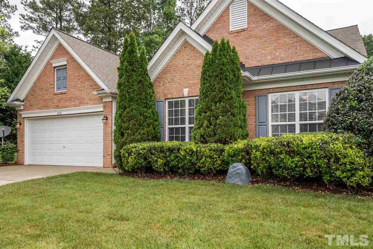 3406 Blessing House Street Raleigh, NC 27614 - Photo 3 of 23 a front view of a house with a garden