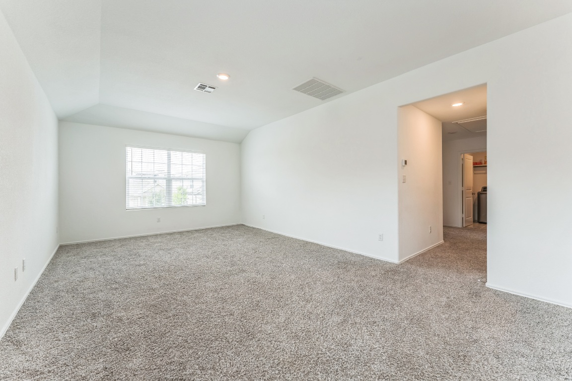 133 Cherry Ridge Road Georgetown, TX 78628 - Photo 26 of 30 an empty room with windows