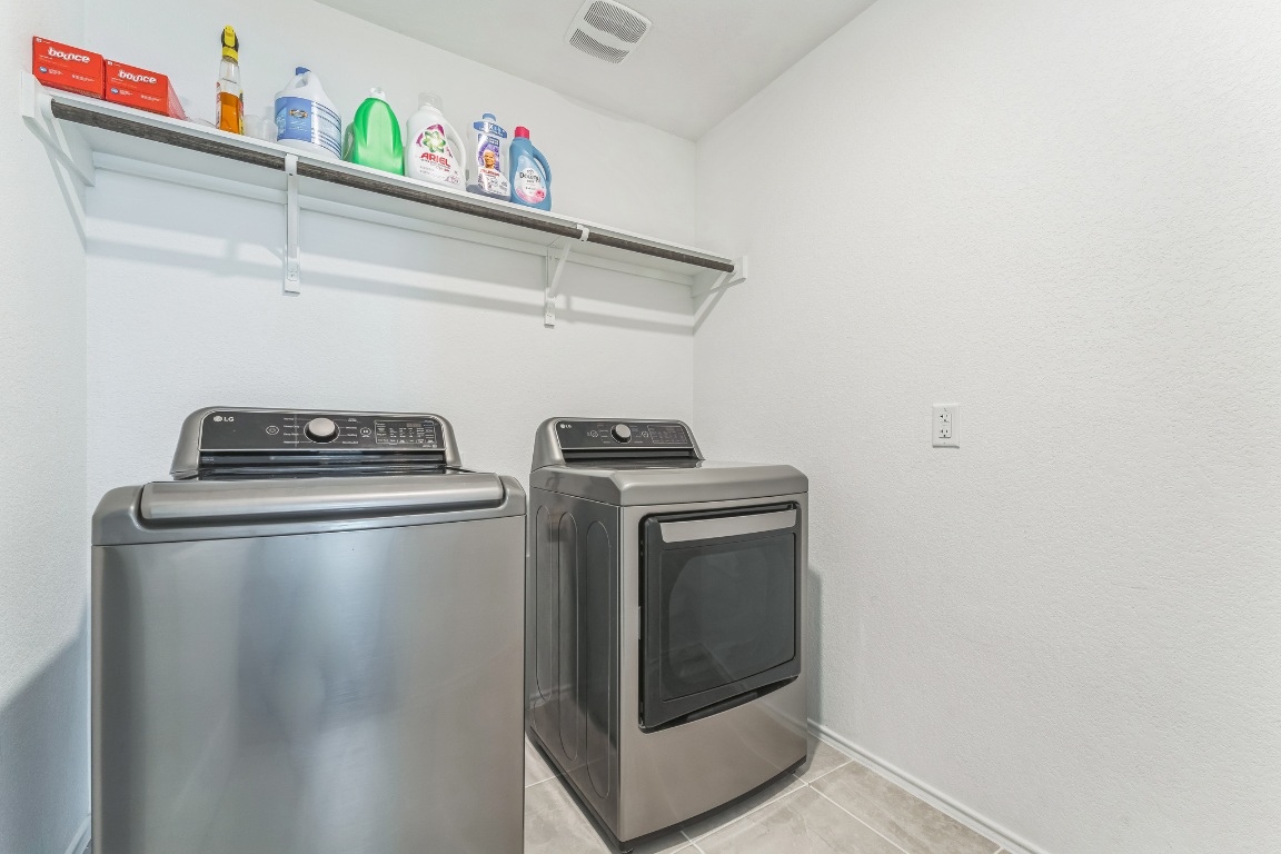 133 Cherry Ridge Road Georgetown, TX 78628 - Photo 30 of 30 a utility room with dryer and washer