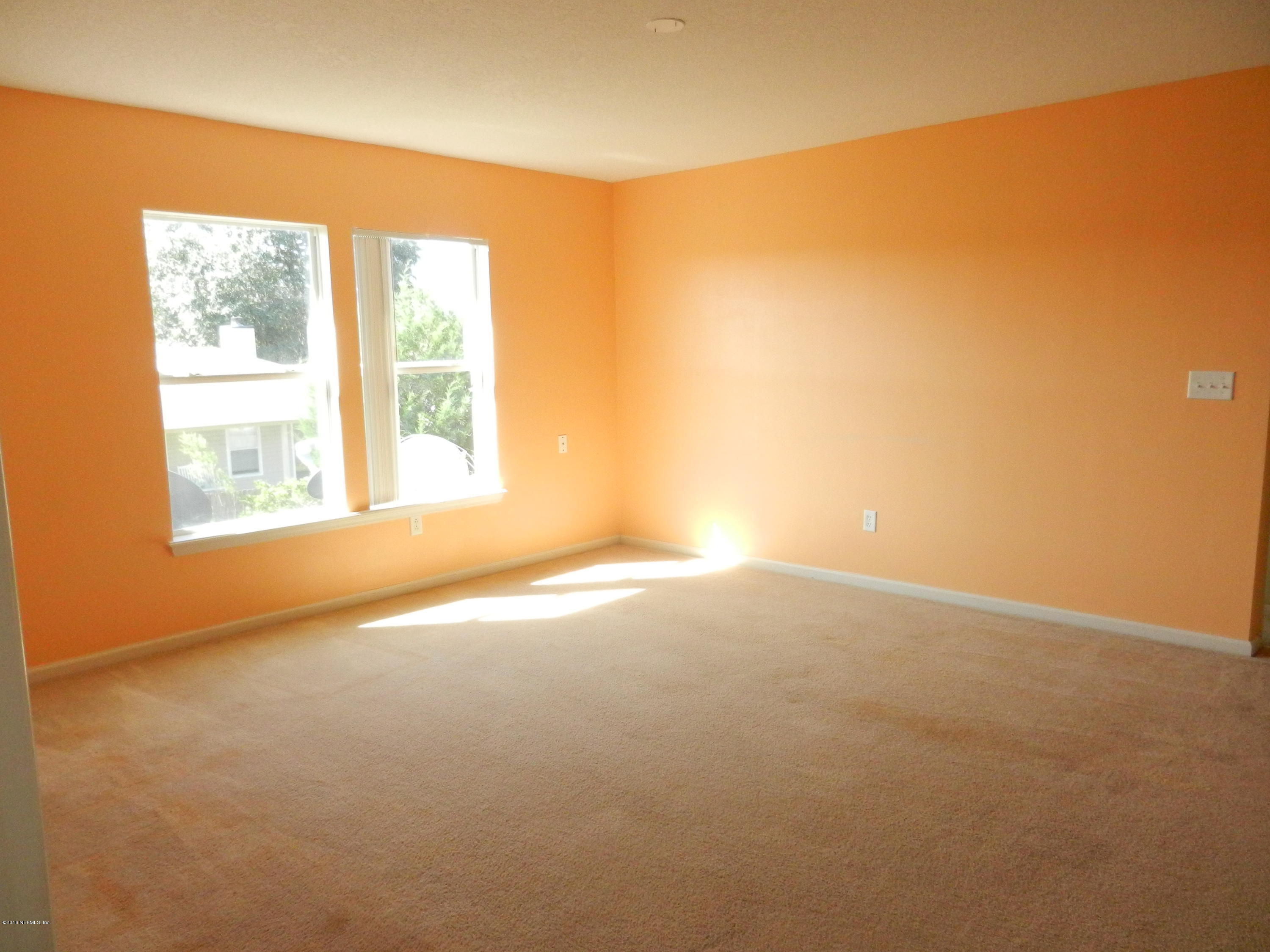 86339 Cartesian Pointe Drive Yulee, FL 32097 - Photo 20 of 21 an empty room with a windows