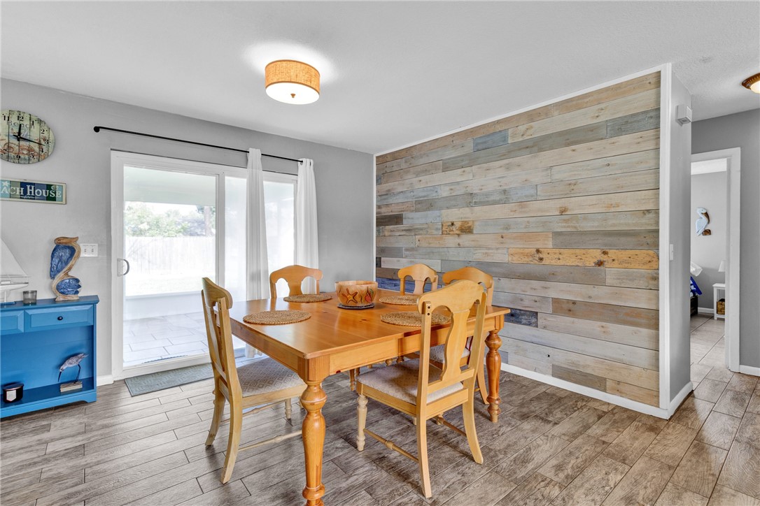 202 Delaware Avenue Sebastian, FL 32958 - Photo 12 of 34 a view of a dining room with furniture and window