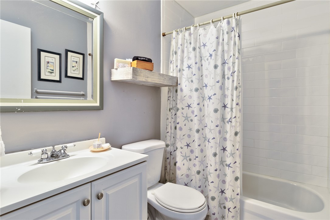 202 Delaware Avenue Sebastian, FL 32958 - Photo 19 of 34 a bathroom with a sink toilet and shower