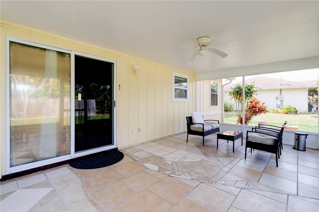 202 Delaware Avenue Sebastian, FL 32958 - Photo 22 of 34 a living room with furniture and a window
