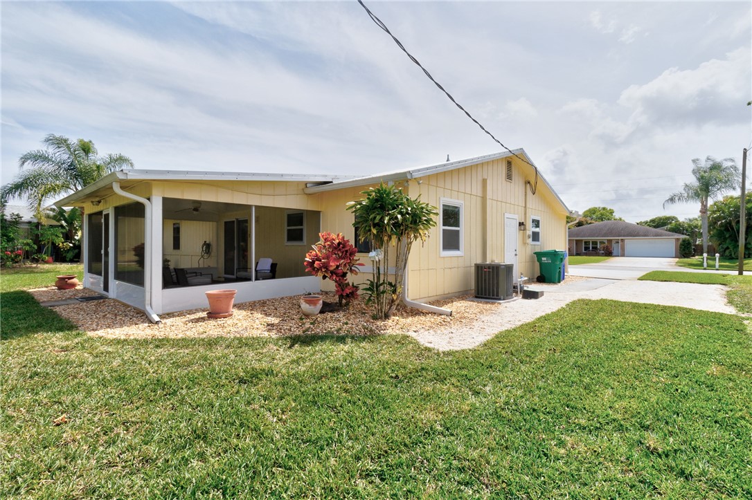 202 Delaware Avenue Sebastian, FL 32958 - Photo 27 of 34 a view of a house with backyard and porch