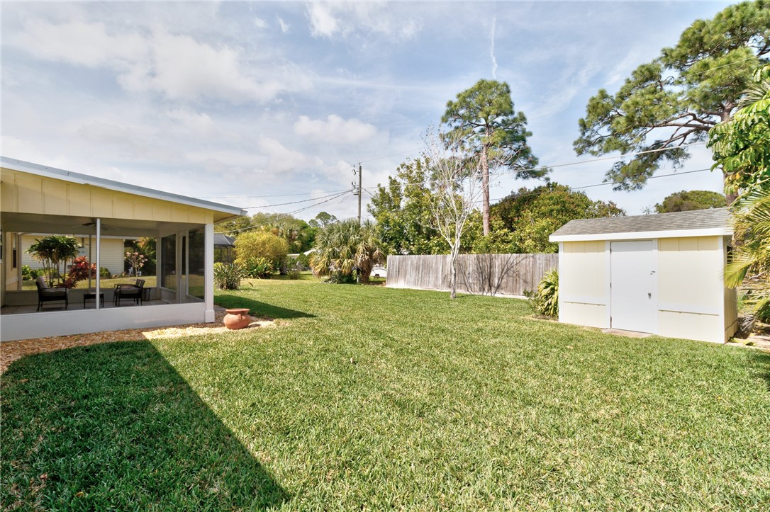 202 Delaware Avenue Sebastian, FL 32958 - Photo 28 of 34 a view of a backyard