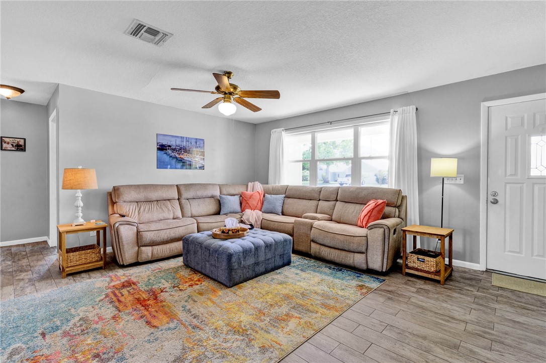 202 Delaware Avenue Sebastian, FL 32958 - Photo 4 of 34 a living room with furniture and a window