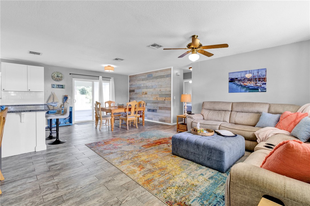 202 Delaware Avenue Sebastian, FL 32958 - Photo 6 of 34 a living room with furniture and wooden floor