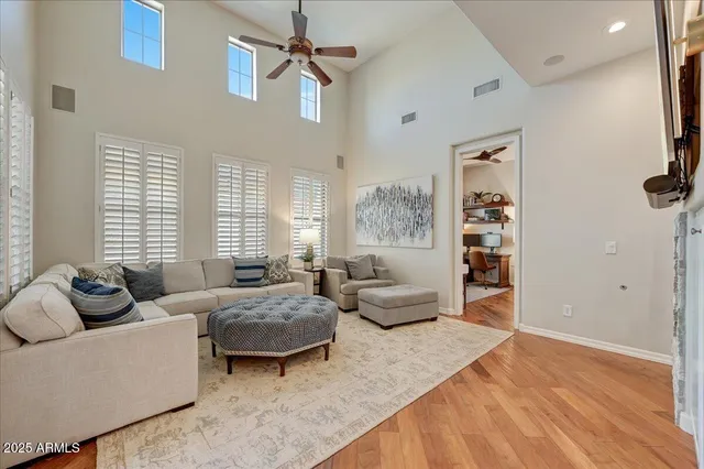 a living room with furniture and a window