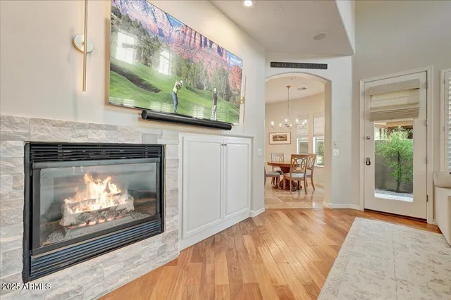 a room with furniture and a fireplace