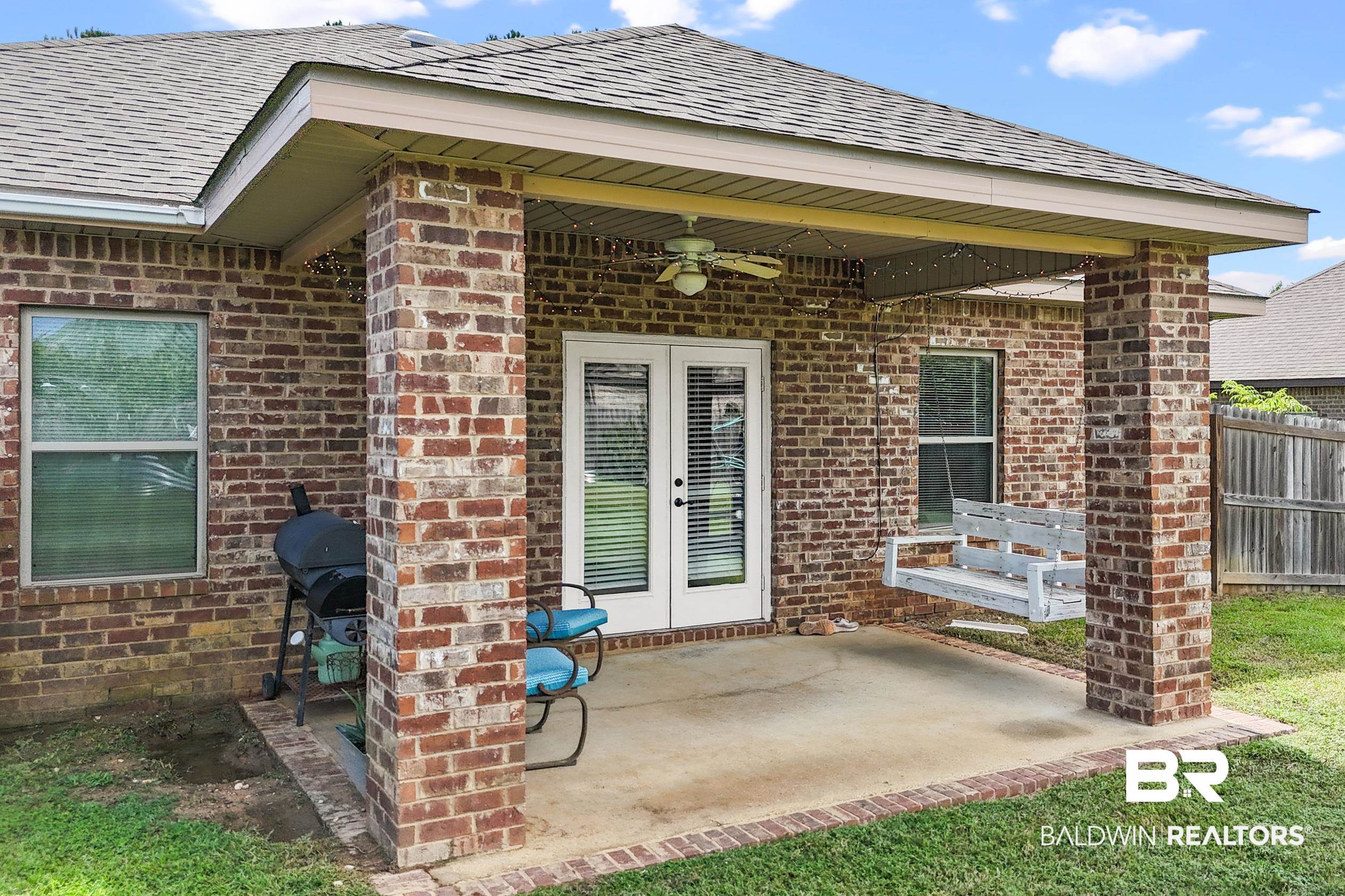 745 Bonaventure Street Fairhope, AL 36532 - Photo 31 of 36 Doorway to property with ceiling fan and a patio area