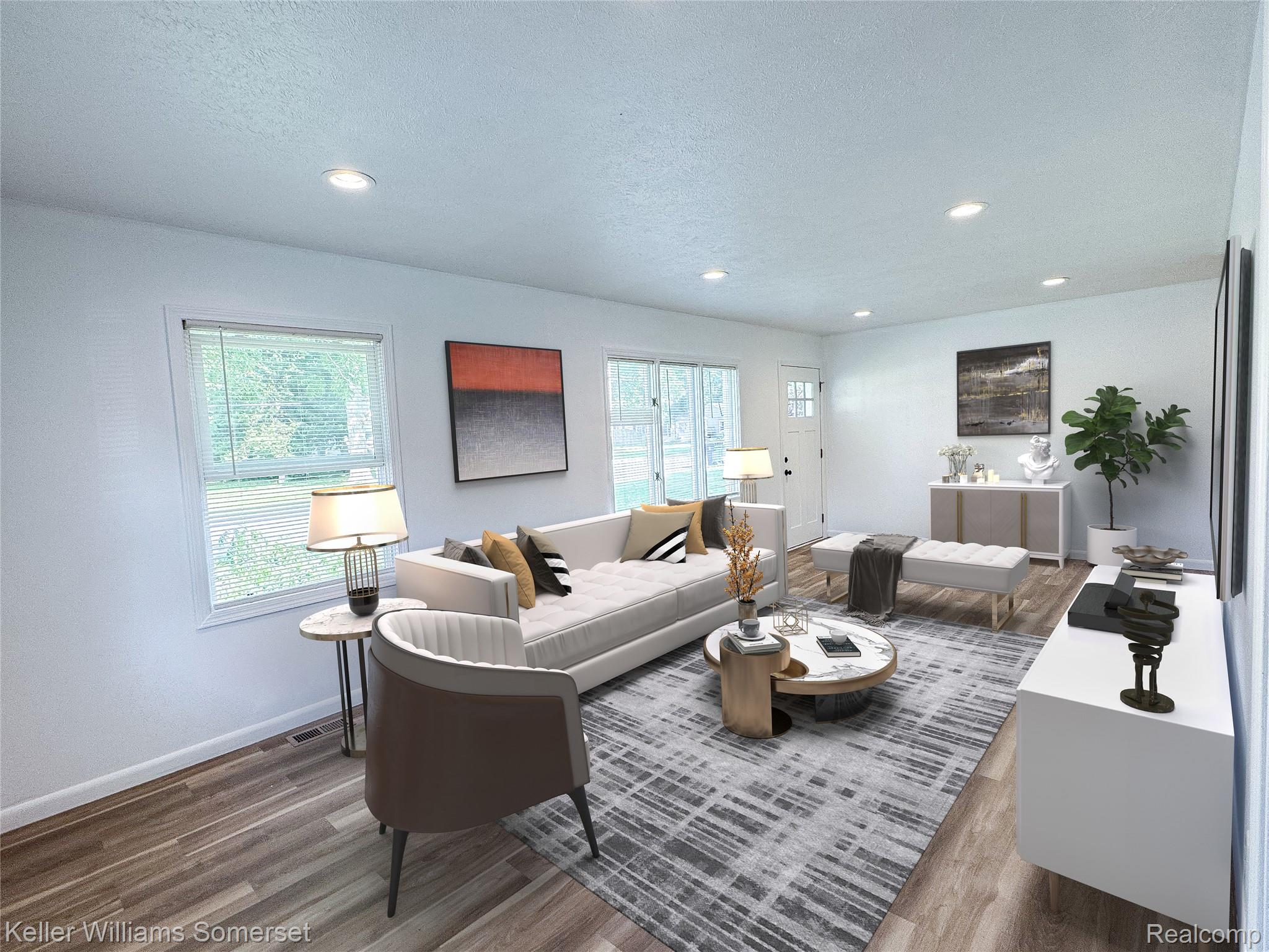 1821 Nazareth Road Kalamazoo, MI 49048 - Photo 6 of 20 Bright living space featuring wood-finish flooring, recessed lighting, multiple windows, and a paneled entry door