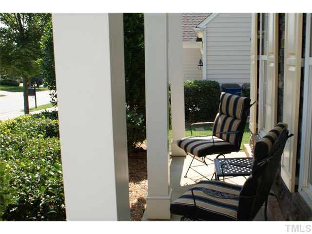 3413 Cathedral Bell Road Raleigh, NC 27614 - Photo 2 of 22 a view of two chairs in the balcony