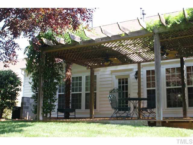 3413 Cathedral Bell Road Raleigh, NC 27614 - Photo 20 of 22 a front view of a house with garden