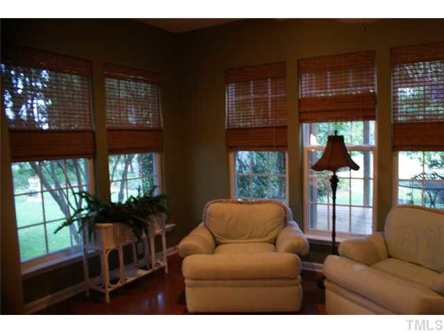 3413 Cathedral Bell Road Raleigh, NC 27614 - Photo 10 of 22 a living room with furniture tv and windows